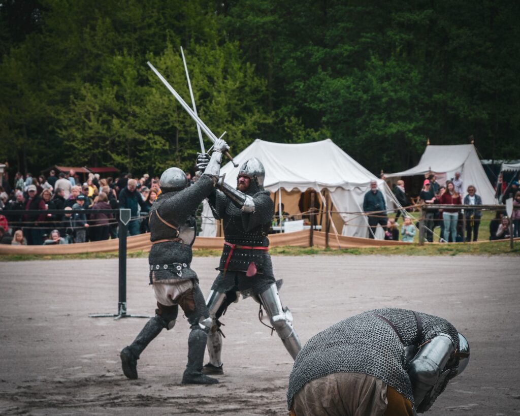 men fighting with sword