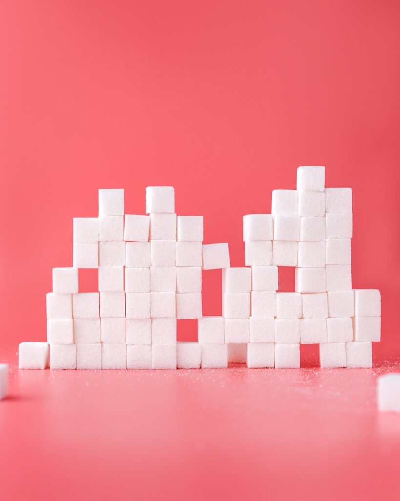 white sugar cube forming lines