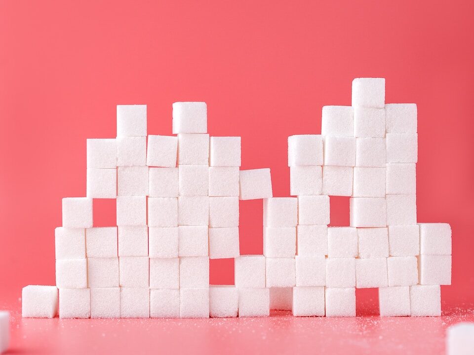 white sugar cube forming lines